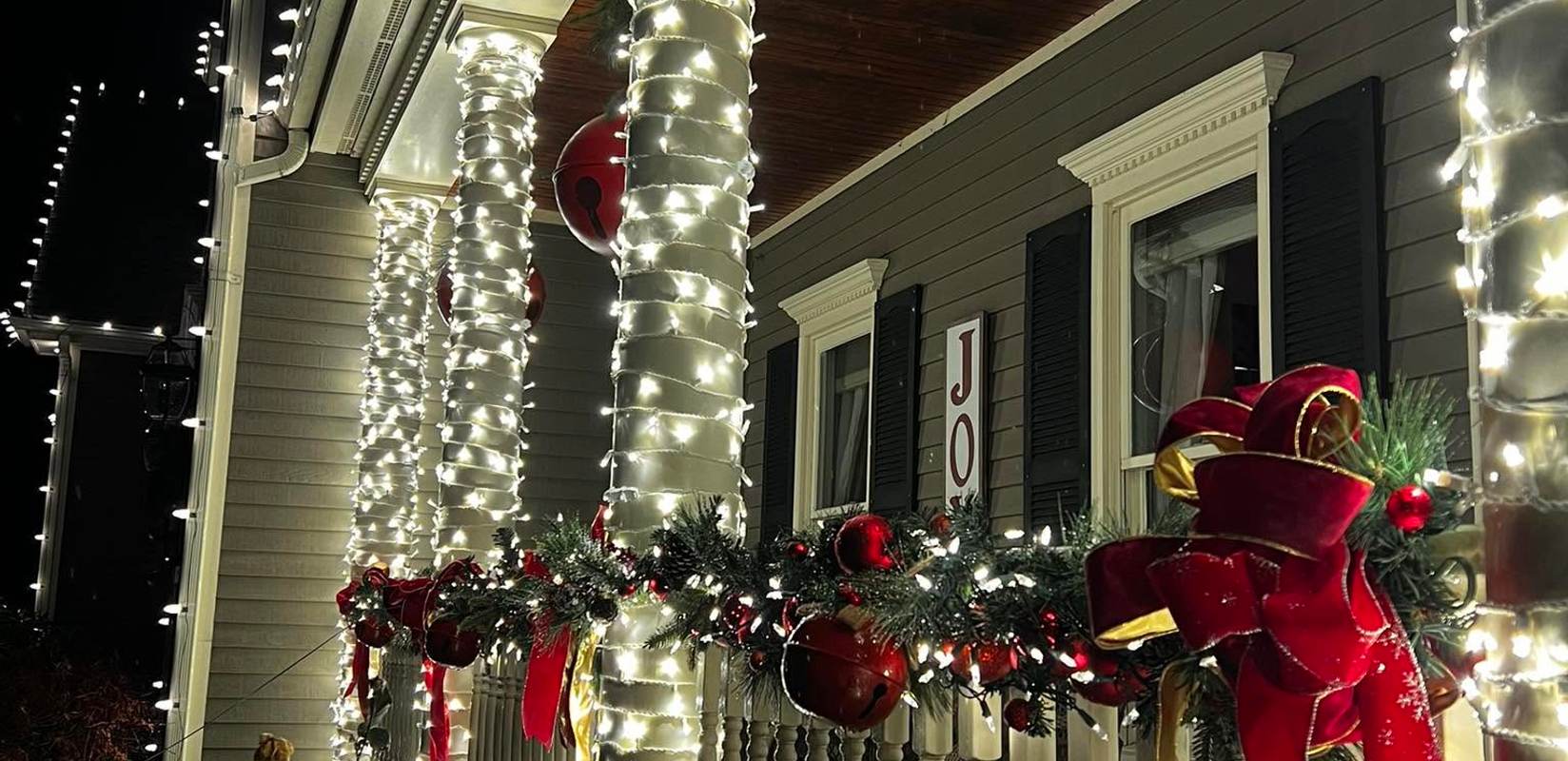 Custom holiday light installation on a Massachusetts home