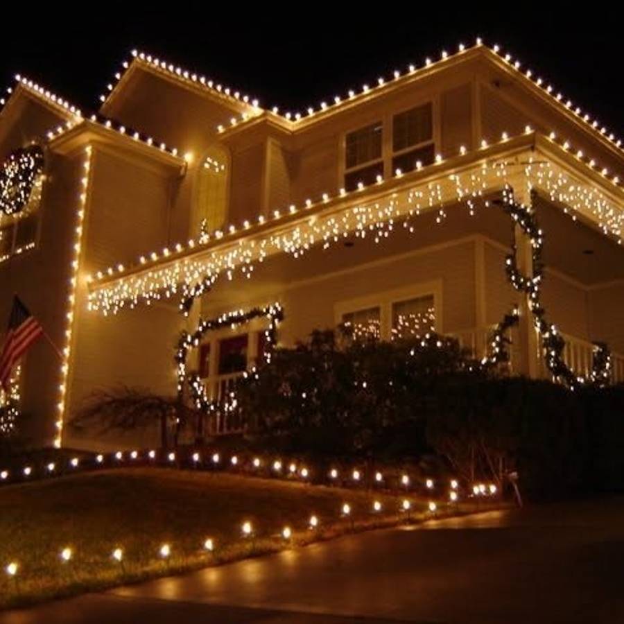 Holiday roofline lighting on a residential home