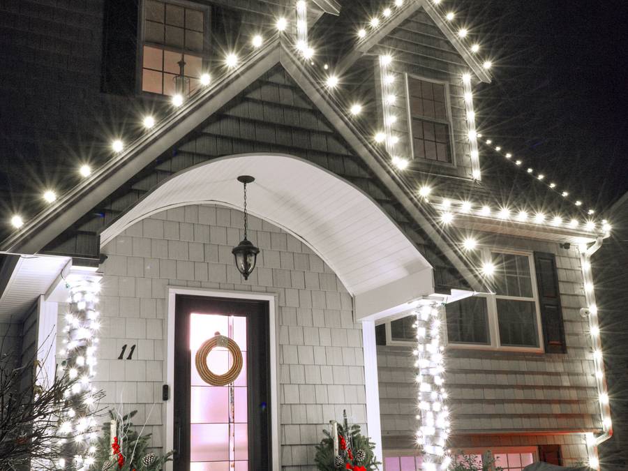 Christmas light installation on a Stoughton area home entry