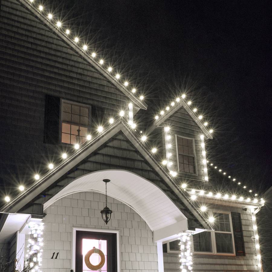 Holiday roofline lighting on a residential home