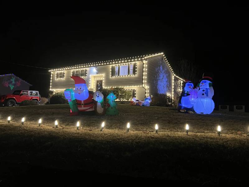 Holiday walkway bulbs, roofline lights and inflatable snowmen