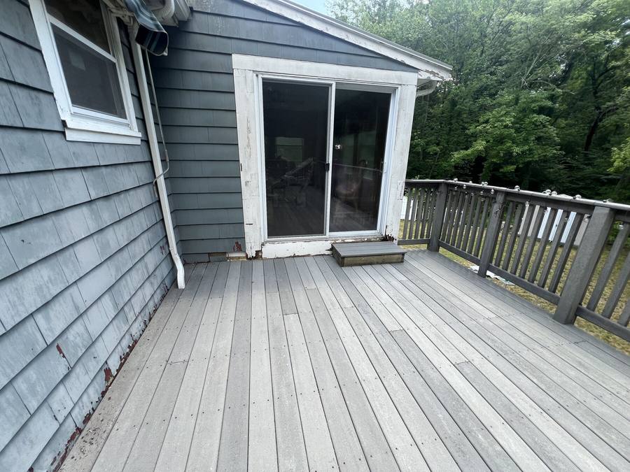 Deck and siding area after exterior soft washing